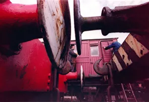 00339 Prints: Tanfield Railway carriage foreman Mel Deighton working on the 50 year old LNER Ballast
