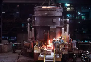 Dramatic Prints: Tapping steel from continuous slab caster in Port Kembla Steel Works in New South Wales