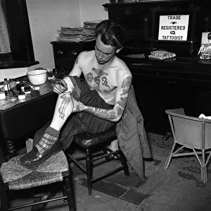 Tattoo artist D. A. Deller seen here at work in his St. Leonards Studio
