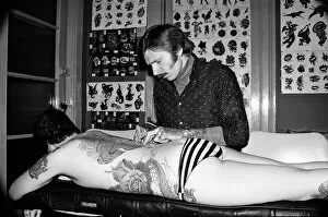 Images Dated 1st March 1977: Tattooist George Bone at work. March 1977