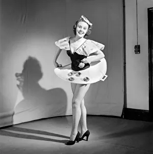 Waitress Prints: Tea for two: Clothing: Fashion: Skirt: Woman wearing skirt containing tea service
