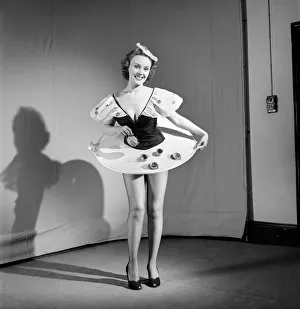 Waitress Prints: Tea for two: Clothing: Fashion: Skirt: Woman wearing skirt containing tea service