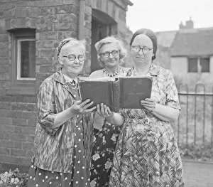 Teachers Prints: Three teachers looking over the log book at Hawkesbury Church of England School
