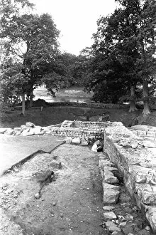 00105 Collection: A team of archaeologists, led by Paul Bidwell, work on a Roman Bridge site in Chollerford