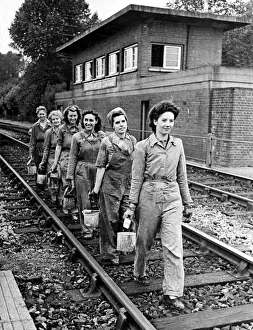 Painter Prints: A team of girl painters employed by the Southern Division of the Southern Railway have