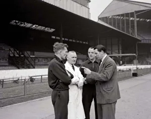 Ted drake with Chelsea members