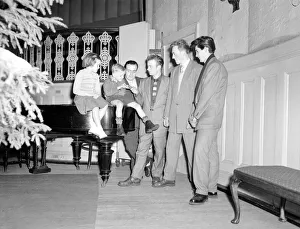 00192 Prints: A Teddy Boys hands out presents at the Christians Rendezous held at the Picton Hall
