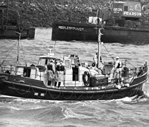 Emergency Services Collection: The Teesmouth lifeboat returning to harbour yesterday with the coxswain safe after he was