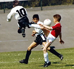 Teesside Athletics Shazad Majid looks on as a team mate battles for possession