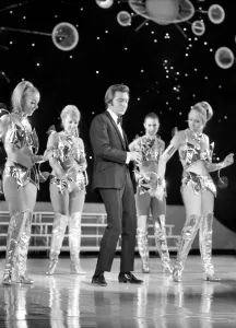 Television presenter Des O Connor on the stage at the London Palladium during