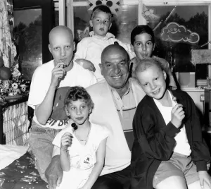 Square Prints: Telly Savalas actor with young cancer patients in June 1989 at the Royal Marsden Hospital