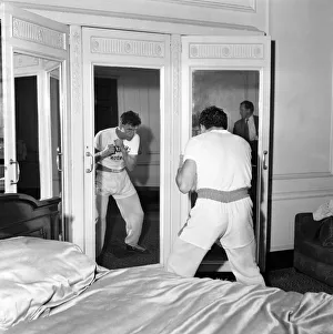 Terry Downs - Boxer: Terry Downs works out in his bedroom at Manchester
