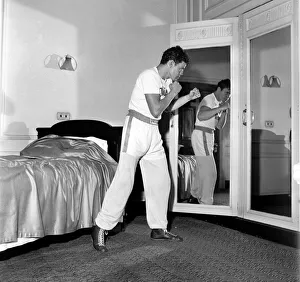 Terry Downs - Boxer: Terry Downs works out in his bedroom at Manchester