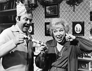 Images Dated 23rd December 1980: Terry & June Actor & Actress in their Christmas show pulling a cracker