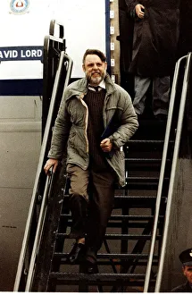 Middle East Prints: Terry Waite former Beirut hostage arrives home descending aircraft steps November 1991