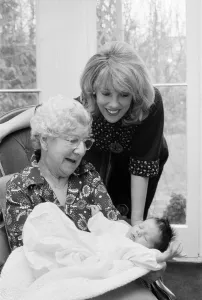 Thats Life'presenter Esther Rantzen presents her month old baby Emily to