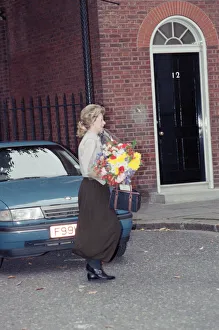Therese Lawson with flowers. On the day Nigel and Therese Lawson move out of Downing