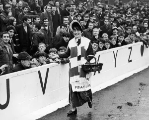 Team Prints: Thirteen year old toffee girl Christine Dunn on the pitch at Goodison Park for the first