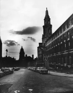 Thje dome of Leeds Town Hall flanked on the left by the Education Office