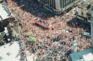 Thousands of England football fans line the streets near Luton airport to welcome their