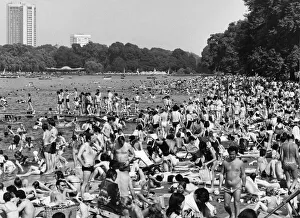Sunshine Prints: Thousands of sunbathers flocked to The Serpentine in Londons Hyde Park today