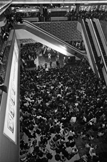 Thousands of young pop fans gather at the Bull Ring Shopping Centre for pop singer