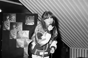 Thousands of young pop fans gather at the Bull Ring Shopping Centre for pop singer