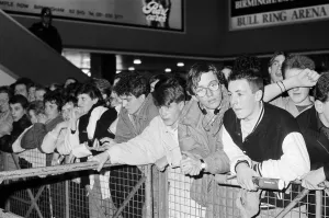 Thousands of young pop fans gather at the Bull Ring Shopping Centre for pop singer