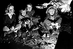 Bonfire Night Prints: The thrills of Guy Fawkes night are reflected in the faces of these youngsters as they