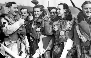 00006 Prints: Thumbs up from crew members of the Wellington plane at an RAF air base January 1940