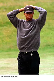 Tiger Woods golfer Hands on his head Looks disappointed practice