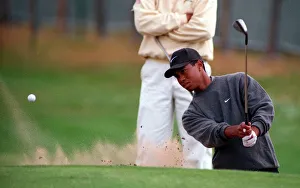 Bunker Prints: Tiger Woods practises for Open Golf Championship July 1997 playing his way out of a