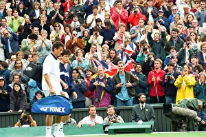 Tim Henman (Great Britain - in blue tracksuit top) and Richard Krajicek