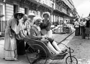 Tim Snelgars Victorian wheelchair is pushed by Miss Sue Gwilt, Mrs Katie Setter