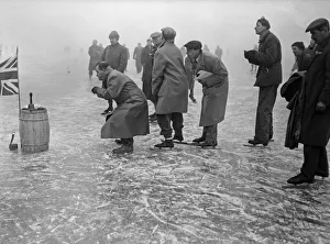 Timekeepers and officials at the finishing line of the speed skating circuit