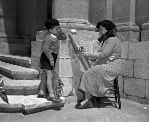 00029 Prints: Tinkers in Malta 1954 Mrs Eucaristica Borg photographed as she works in