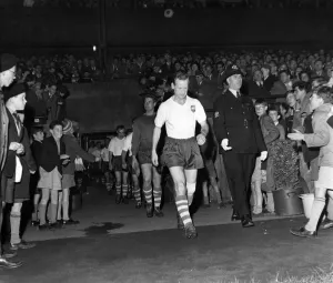 00252 Prints: Tom Finneys Testimonial Match. Tom leads his team on to the fiels