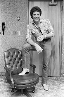 01336 Prints: Tom Jones in concert in America. Pictured relaxing backstage. April 1983