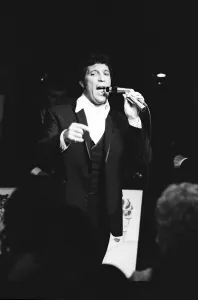 Tom Jones gets the audience dancing on the tables at the Copacabana nightclub, New York