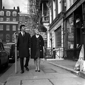 Tom Jones pop star and his wife Lyn Jones in London March 1965 do some house
