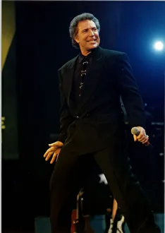 Tom Jones singer Holding Microphone at Simple Truth Concert at Wembley