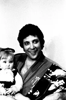 Tom Jones with three year old hole-in-the-heart patient Lisa Anne Scott from Gateshead