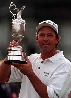 Tom Lehman holds the trophy after beating Nick Faldo at British Open Royal Lytham St