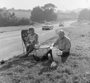 Tranquil Prints: Tom and Lily Mattingly of Brentwood, Essex enjoy a picnic on the side of the main Newton