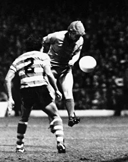 Tommy Burns footballer Celtic FC in UEFA Cup match heading the ball football strip