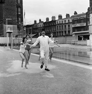 00804 Prints: Tommy Cooper opening the Oasis outdoor swimming pool in Holborn for the season