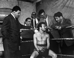 Tommy McGovern, the British lightweight champion gets some good advice when training in