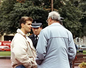 Scotland Prints: Tommy Sheridan speaking to policemen during a Poll Tax protest in Glasgow. 29th June 1990