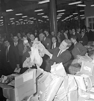Post Office Prints: Tony Benn Labour MP July 1964 at Mount Pleasant sorting office London holding a turkey