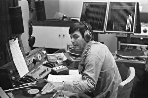 Tony Blackburn, the 22 year old Disc Jockey, during his broadcast of the very first show
